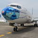 A Garuda Indonesia Boeing 373-800 NG with a new face mask design as part of a campaign to promote the wearing of face masks amid the COVID-19 coronavirus, is parked at the airport in Tangerang on October 12, 2020.